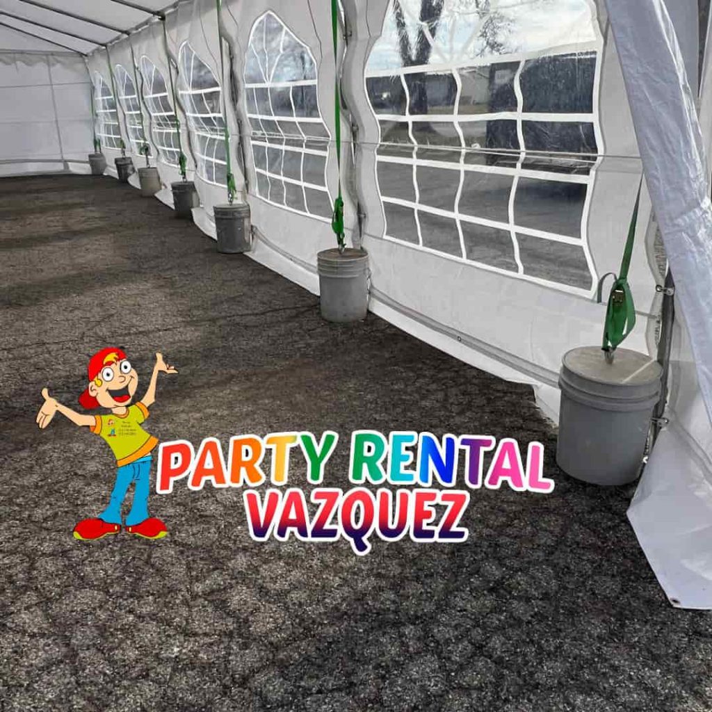 event tent secured with heavy-duty concrete blocks for safe installation on concrete surfaces by Party Rental Vazquez in Columbus, Indiana.